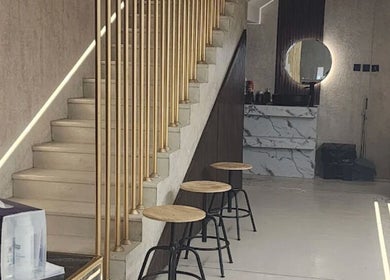 Interior of مركز ليلا للتزيين النسائي with sleek stairs and stylish decor in Riyadh, Riyadh Province, SA.