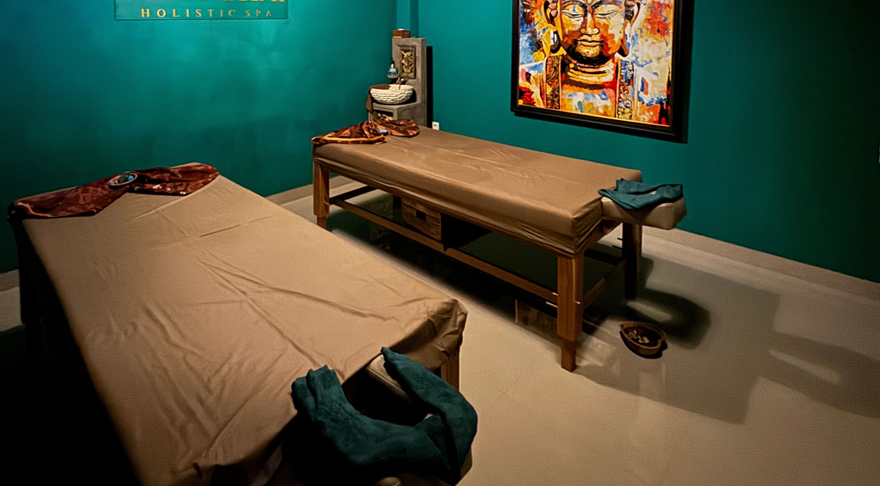 Relaxing massage room at Hati Thai - Holistic Spa - Canggu, Bali, Bali, ID with two massage tables and soothing decor.