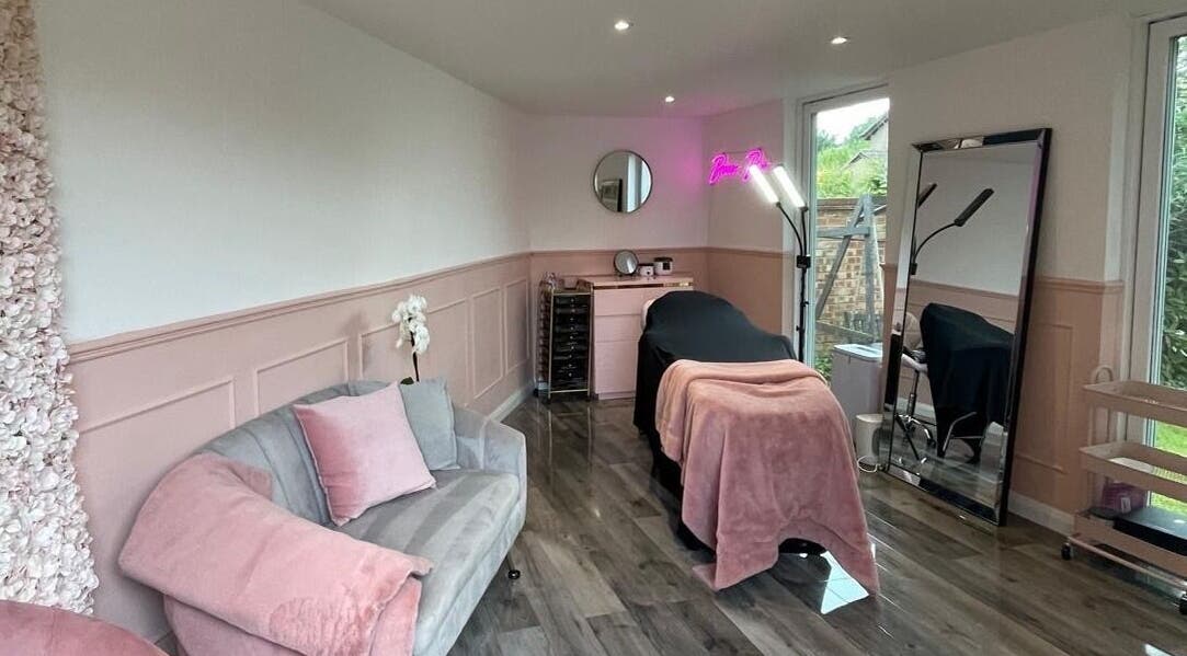 Elegant treatment room at Emma Beauty Mk in Newport Pagnell, England, GB with cozy pink and gray decor.