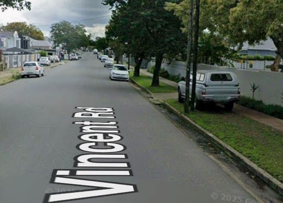 View of Vincent Rd near Meg Esthetics Slimming & Beauty Salon, East London, Eastern Cape, ZA with parked cars.