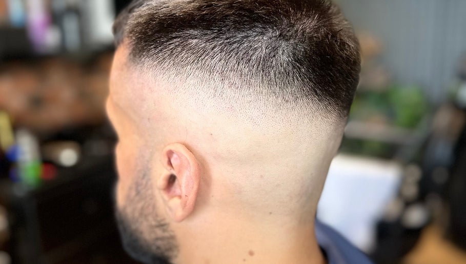 Close-up of a precise fade haircut at Scissorhandssignature, Dubai, Dubai, AE.