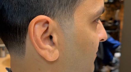 Close-up of a fresh fade haircut at Scissorhandssignature, Dubai, Dubai, AE, showcasing men's grooming excellence.