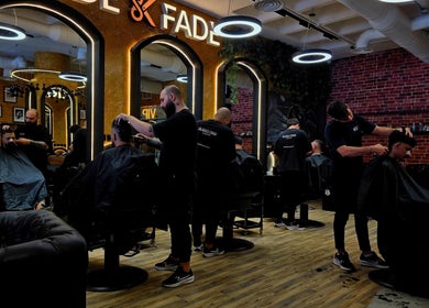 Professional barbers at Blade and Fade, Riyadh, Riyadh Province, SA, offering top-notch haircuts and grooming services.