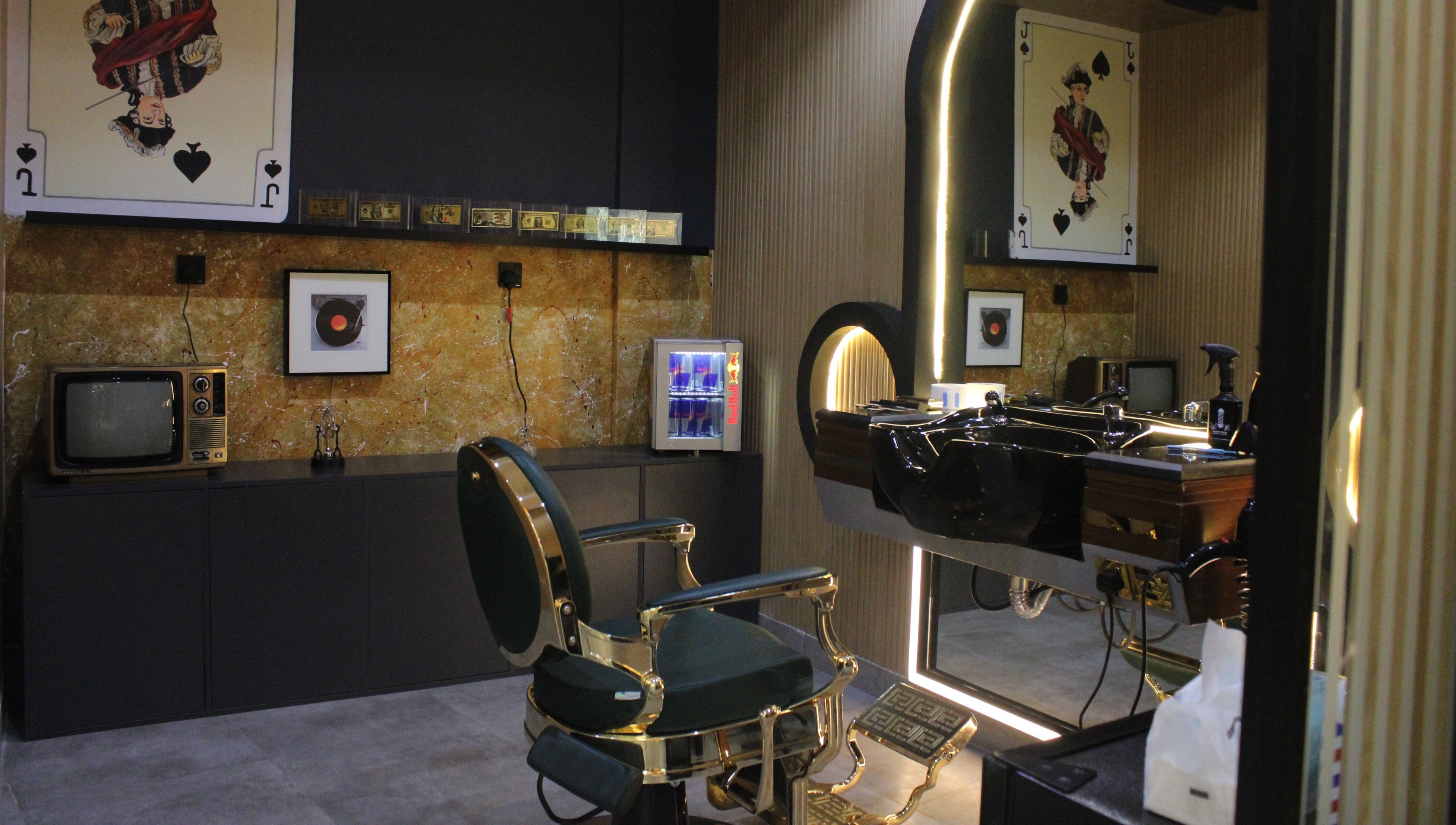Vintage-inspired salon interior at Blade and Fade in Riyadh, Riyadh Province, SA with retro decor.