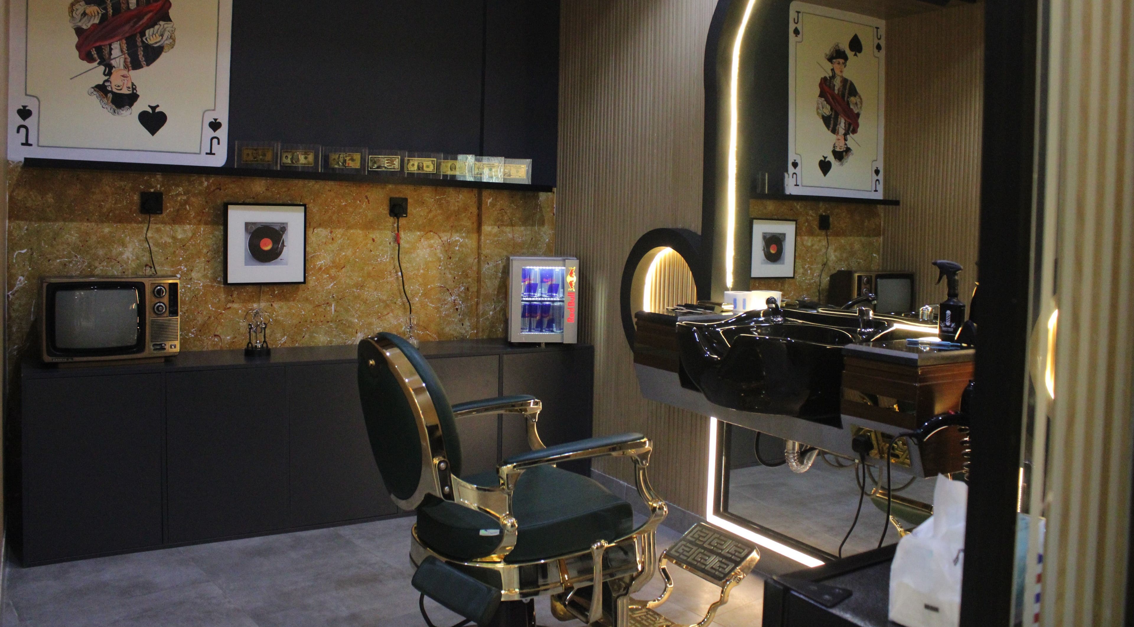 Vintage-inspired salon interior at Blade and Fade in Riyadh, Riyadh Province, SA with retro decor.