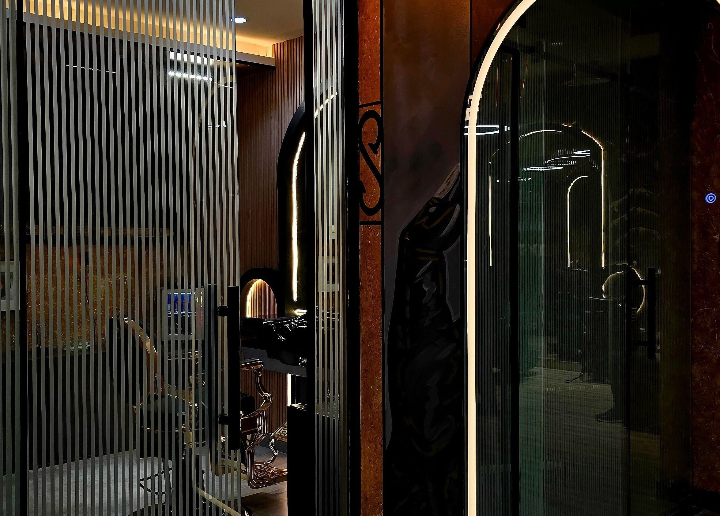 Stylish interior of Blade and Fade in Riyadh, Riyadh Province, SA, featuring sleek design and ambient lighting.