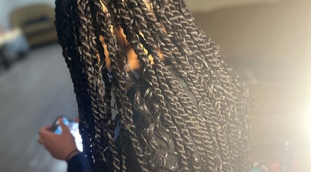 Close-up of stylish twists hairstyle at KountryStyles, Marietta, Georgia, US, creating a sophisticated look.