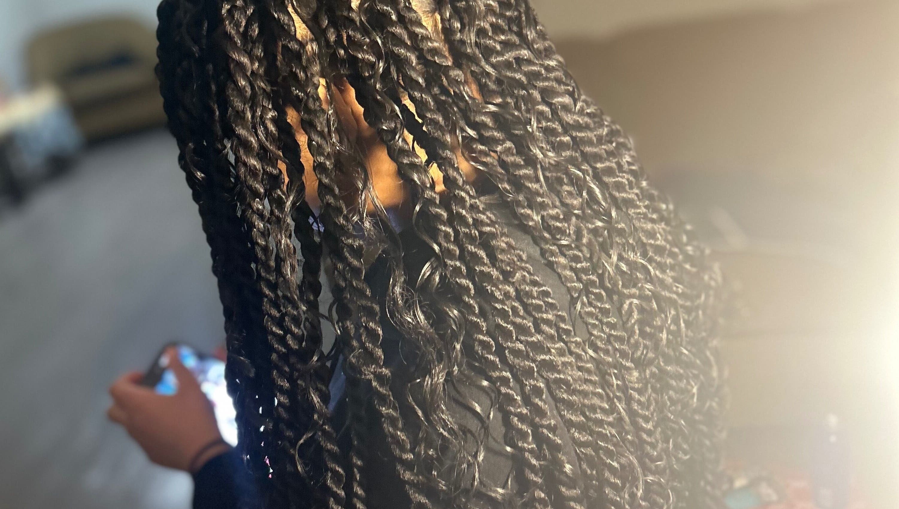 Intricate braided hairstyle at KountryStyles in Marietta, Georgia, US, showcasing professional hairstyling.