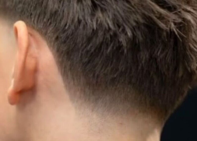 Close-up of a neat fade haircut at The Salty Barber, Manawatū-whanganui, Manawatū-whanganui, NZ.