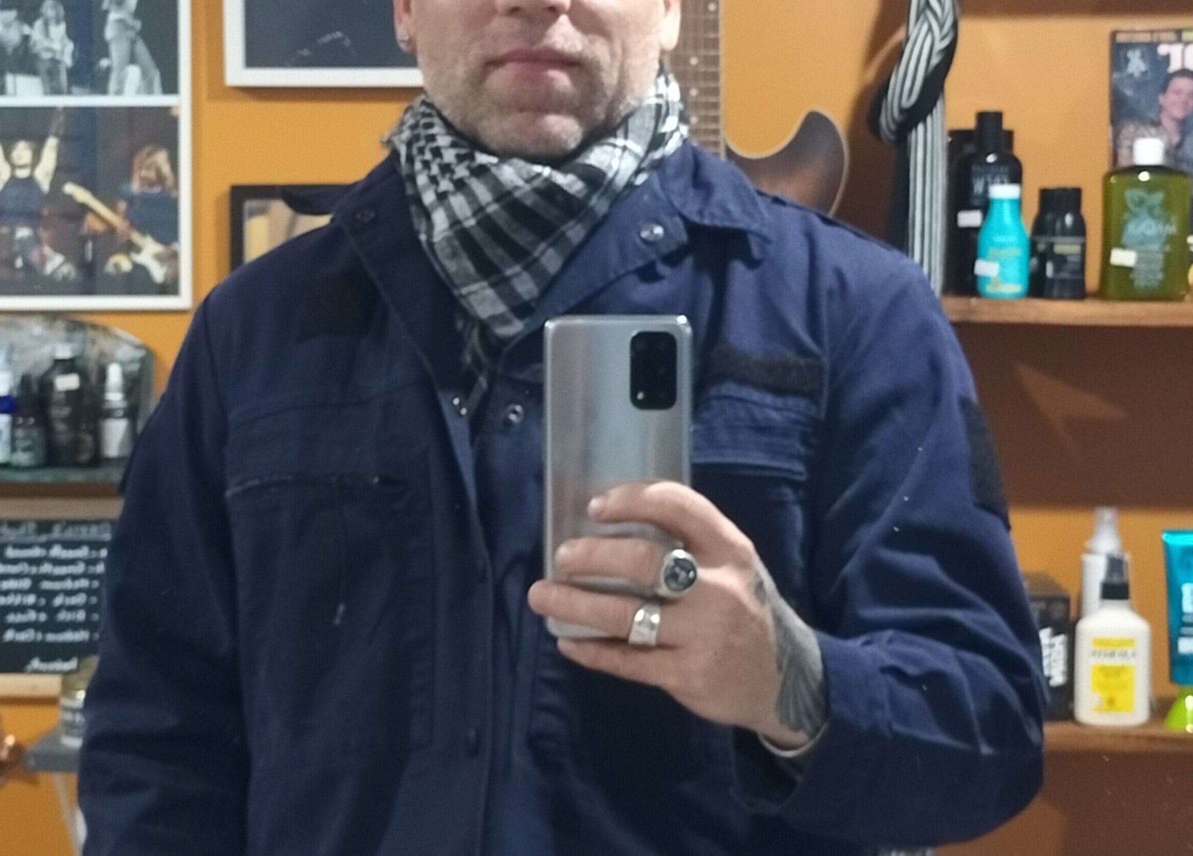 Stylish interior of The Salty Barber in Manawatū-whanganui, NZ with modern grooming products displayed.