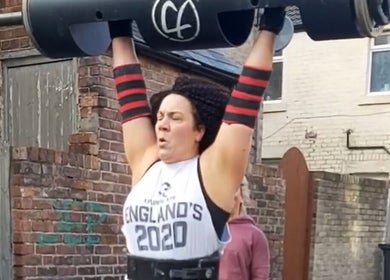 Athlete lifting weights at A.S.Sports Therapist, Cramlington, England, GB, showcasing strength and fitness.