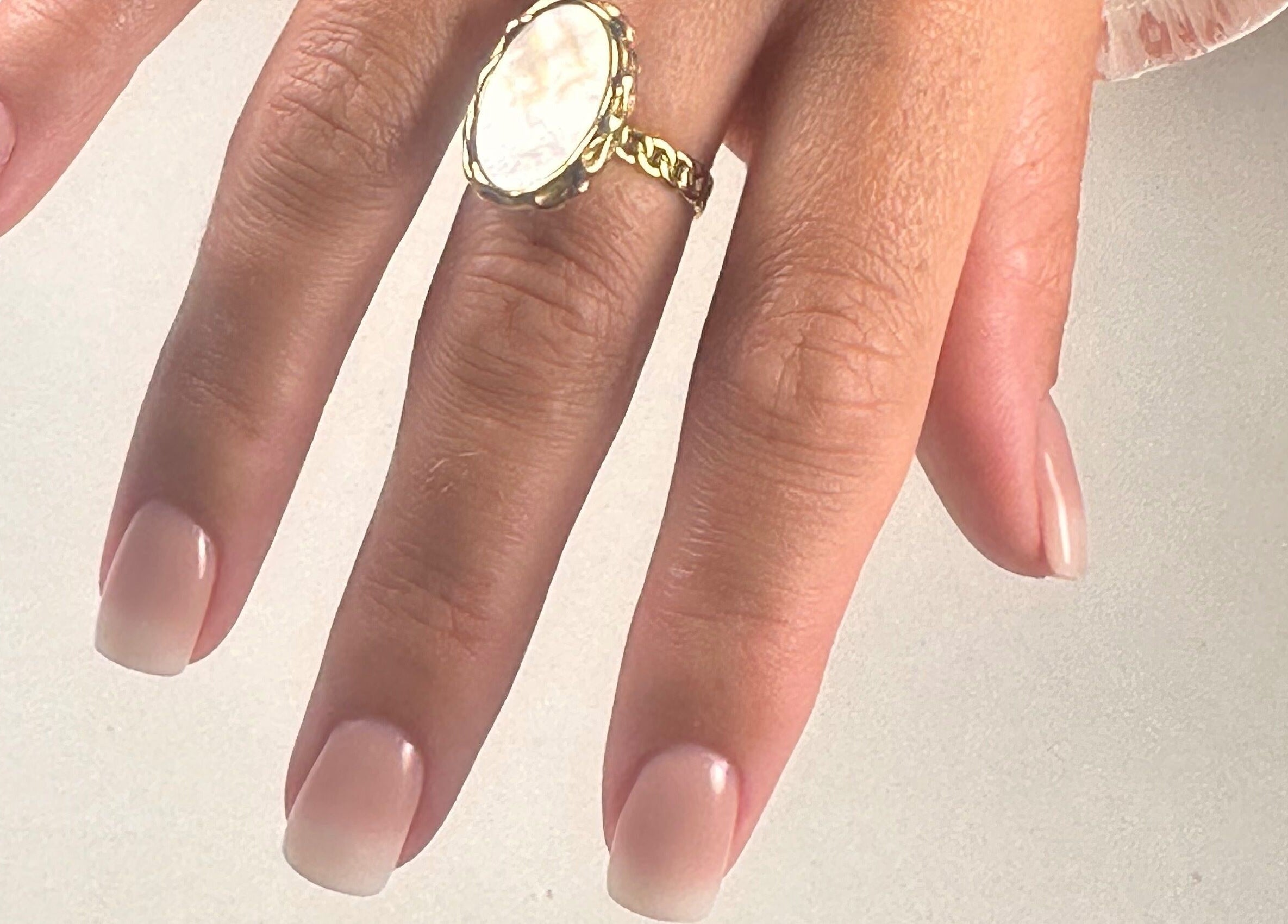 Beautiful manicured nails with soft pink polish at Nails by Azi, Royal Leamington Spa, England, GB.