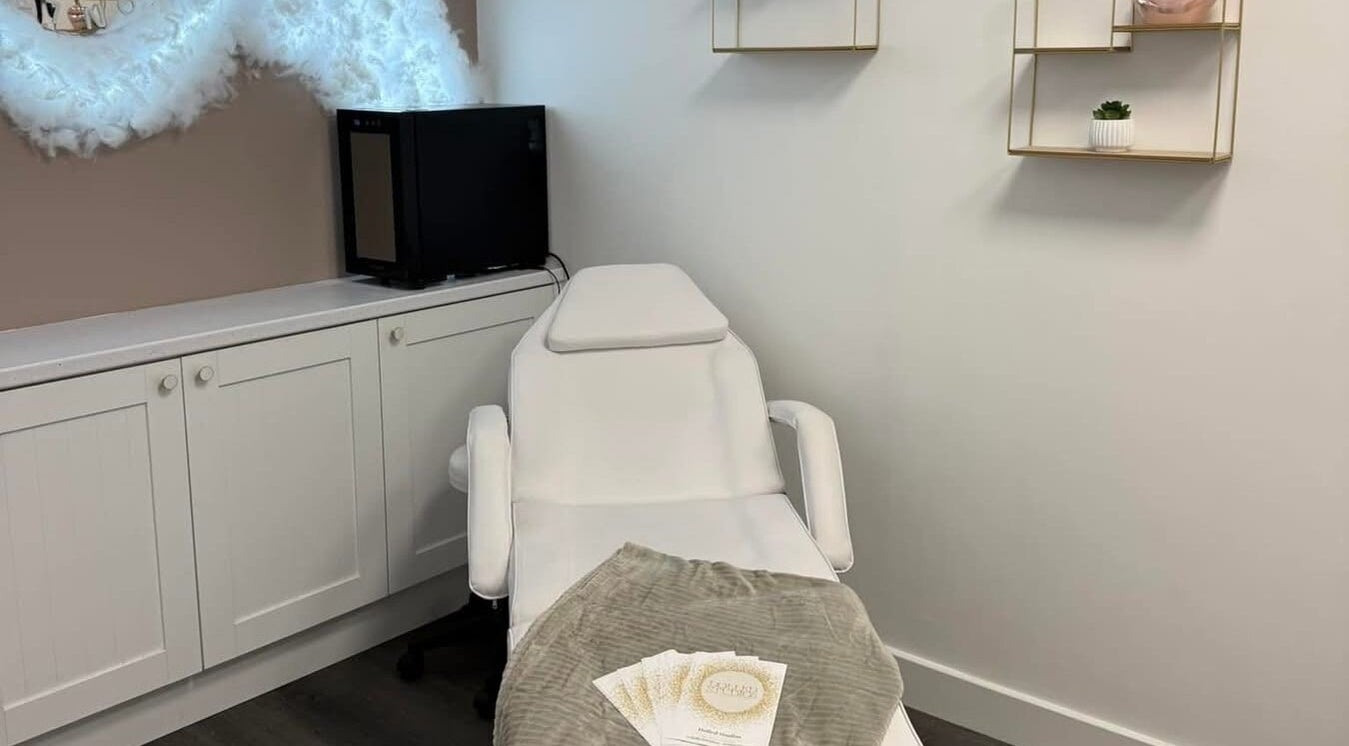 Modern beauty treatment room at Dolled Studios, Clipstone, England, GB with a comfortable spa chair.