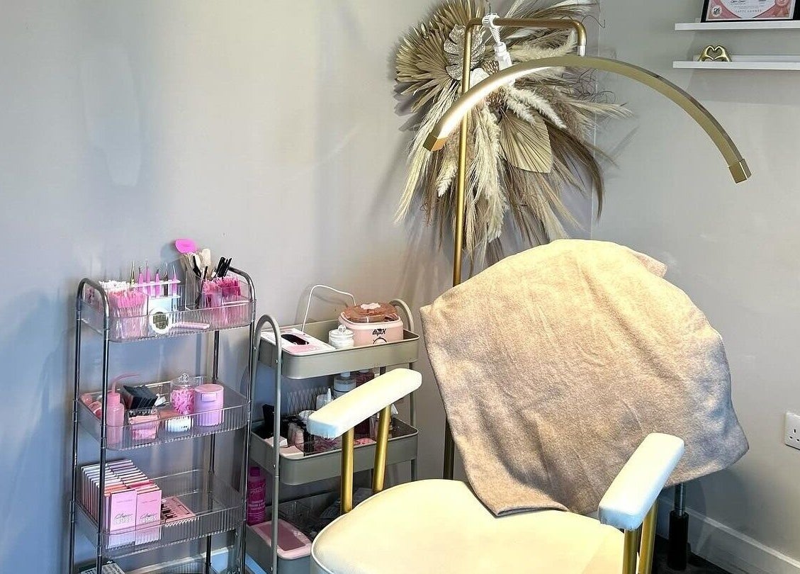 Dolled Studios treatment chair in Clipstone, England, GB, with tools and decor for beauty services.