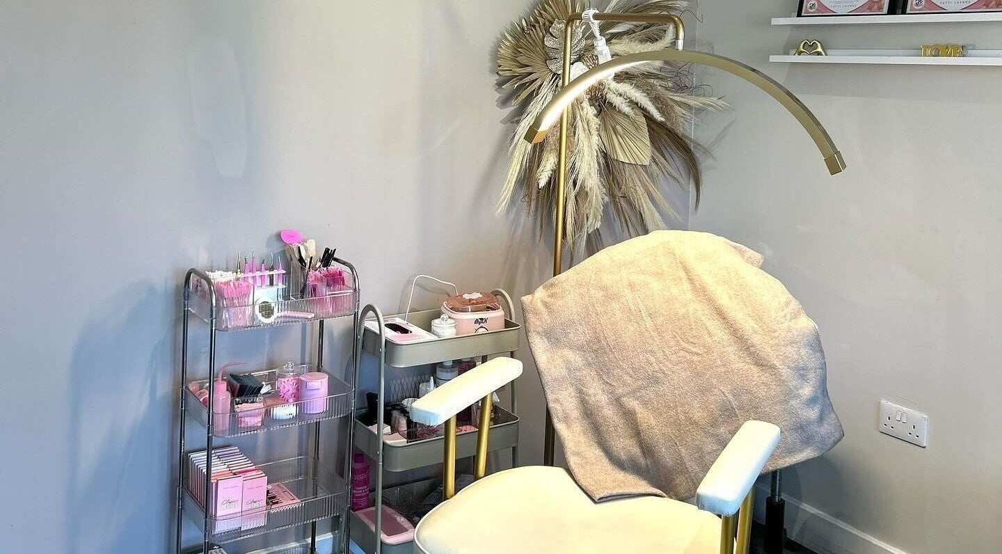 Dolled Studios treatment chair in Clipstone, England, GB, with tools and decor for beauty services.
