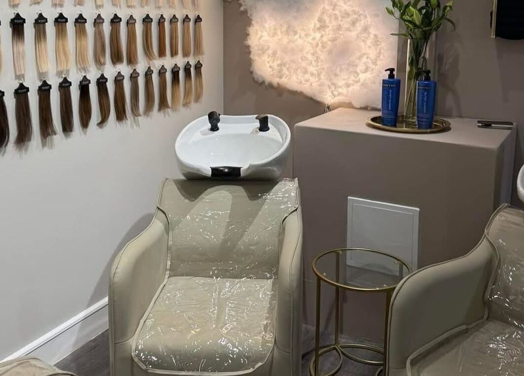 Hair salon washing station at Dolled Studios, Clipstone, England, GB showcasing elegance and style.