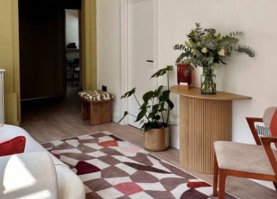 Elegant waiting area at DermaBalance, Royal Tunbridge Wells, England, GB with modern decor and floral accents.