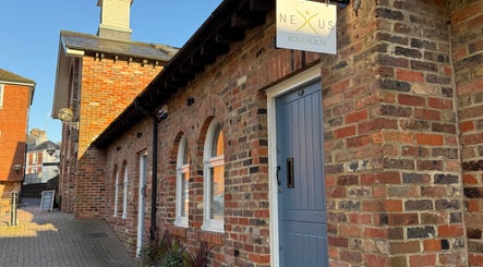 Brick exterior of DermaBalance in Royal Tunbridge Wells, England, GB, showcasing classic architectural details.
