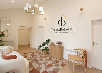 Elegant reception at DermaBalance, Royal Tunbridge Wells, England, featuring modern decor and soft lighting.