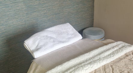 Comfortable massage bed at Urban Oasis Massage Therapy, Swinton, England, GB, offering ultimate relaxation.
