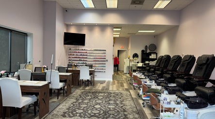 Elegant interior of Misheel Nail Spa in Vernon Hills, Illinois, US with modern manicure and pedicure stations.