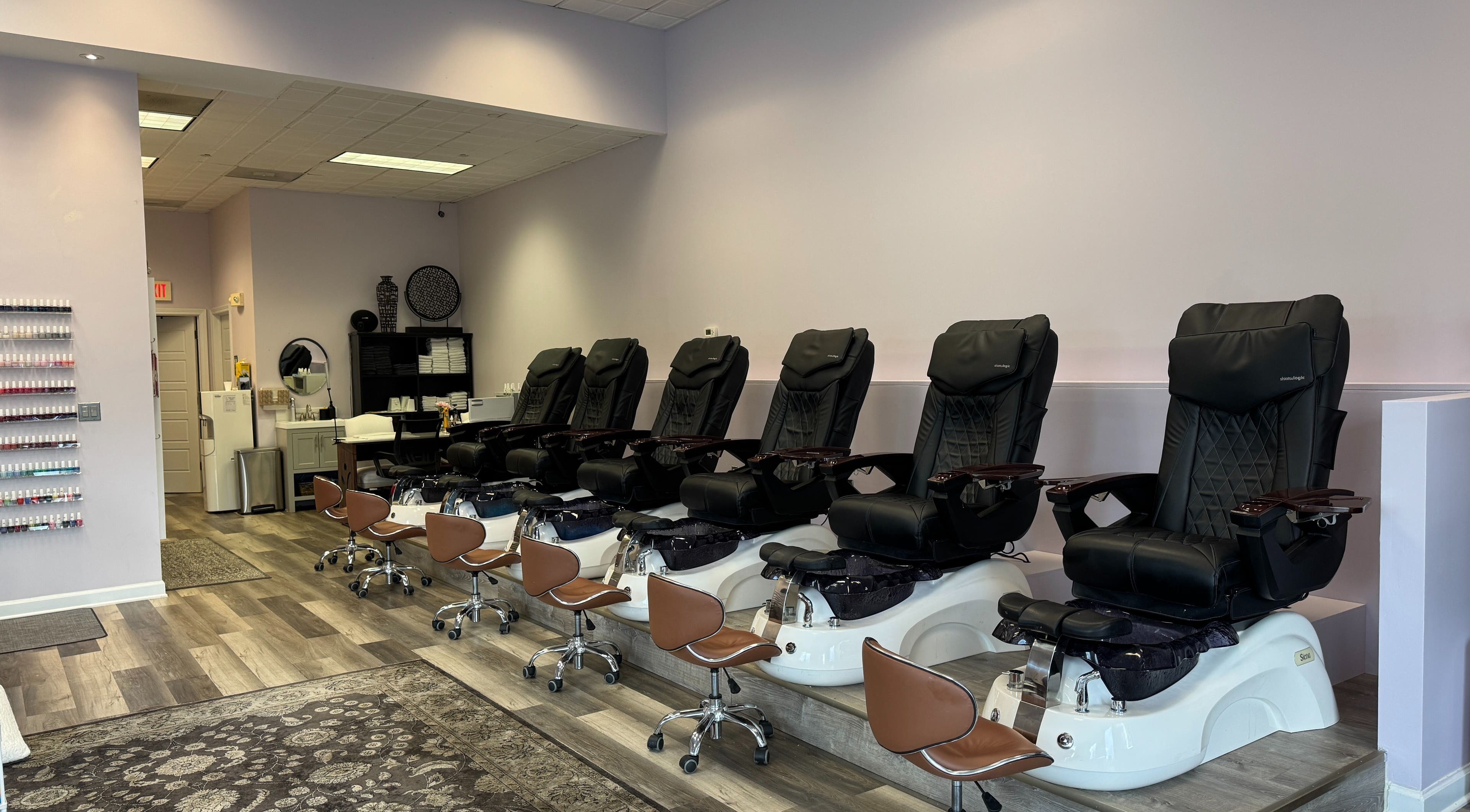 Luxurious pedicure chairs at Misheel Nail Spa in Vernon Hills, Illinois, US ready for relaxation.