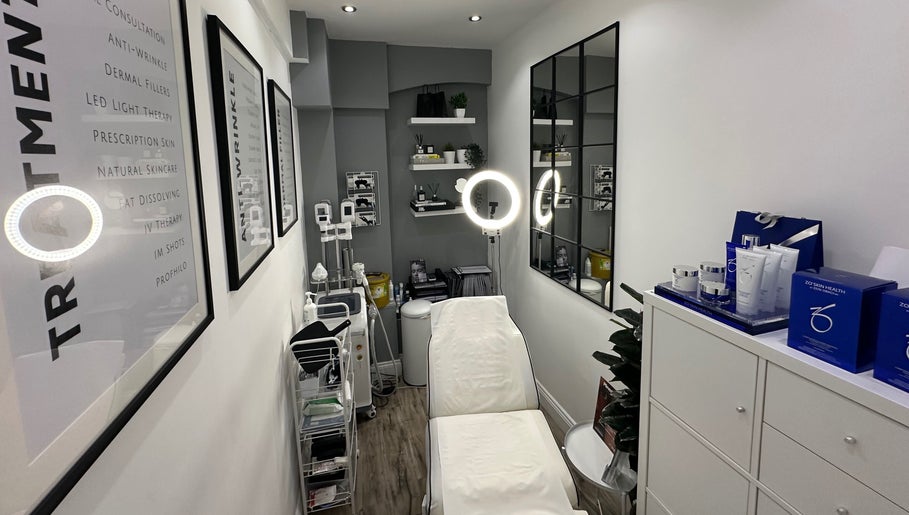 Modern treatment room at The Private Practice in Birmingham, England, GB, featuring advanced skincare equipment.