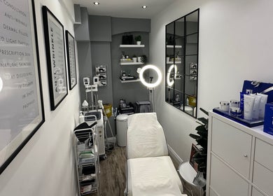Modern treatment room at The Private Practice in Birmingham, England, GB, featuring advanced skincare equipment.