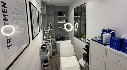 Modern treatment room at The Private Practice in Birmingham, England, GB, featuring advanced skincare equipment.