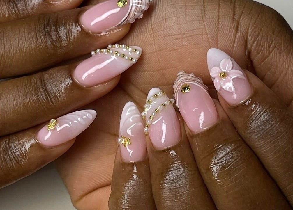 Intricate pink nail art with beads at Brittz Nailz, Mandeville, Manchester Parish, JM.