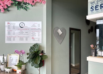 Interior of Su Microblading & Wellness Massage in Parker, Colorado, US showcasing menu and decor.