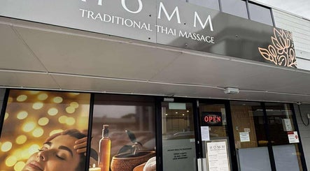Facade of Homm Thai Massage, Auckland, NZ, inviting ambiance with serene decor.