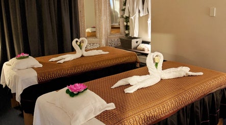 Peaceful massage room at Homm Thai Massage, Auckland, NZ with elegant decor and fresh linens.