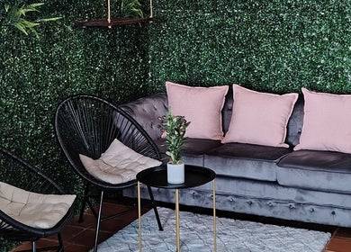Chic lounge area at Prim Nails Skin Hair in Pretoria, Gauteng, ZA, featuring modern decor and comfortable seating.
