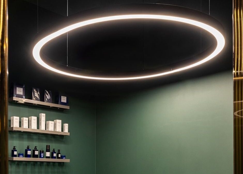 Sleek interior lighting at S&B Grooming, دبي, دبي, AE, highlighting displayed premium grooming products.