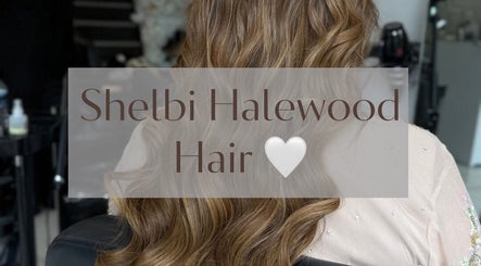 Elegant hairstyle displayed at Shelbi Halewood Hair, Prestwich, England, GB. Luxurious salon experience.