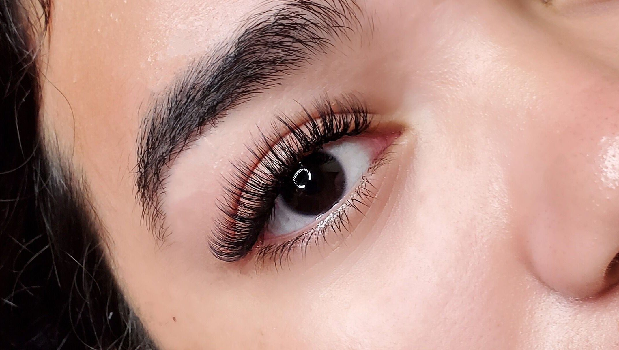 Close-up of lush eyelashes at London Aesthetics, London, Ontario, CA for beauty enhancement.