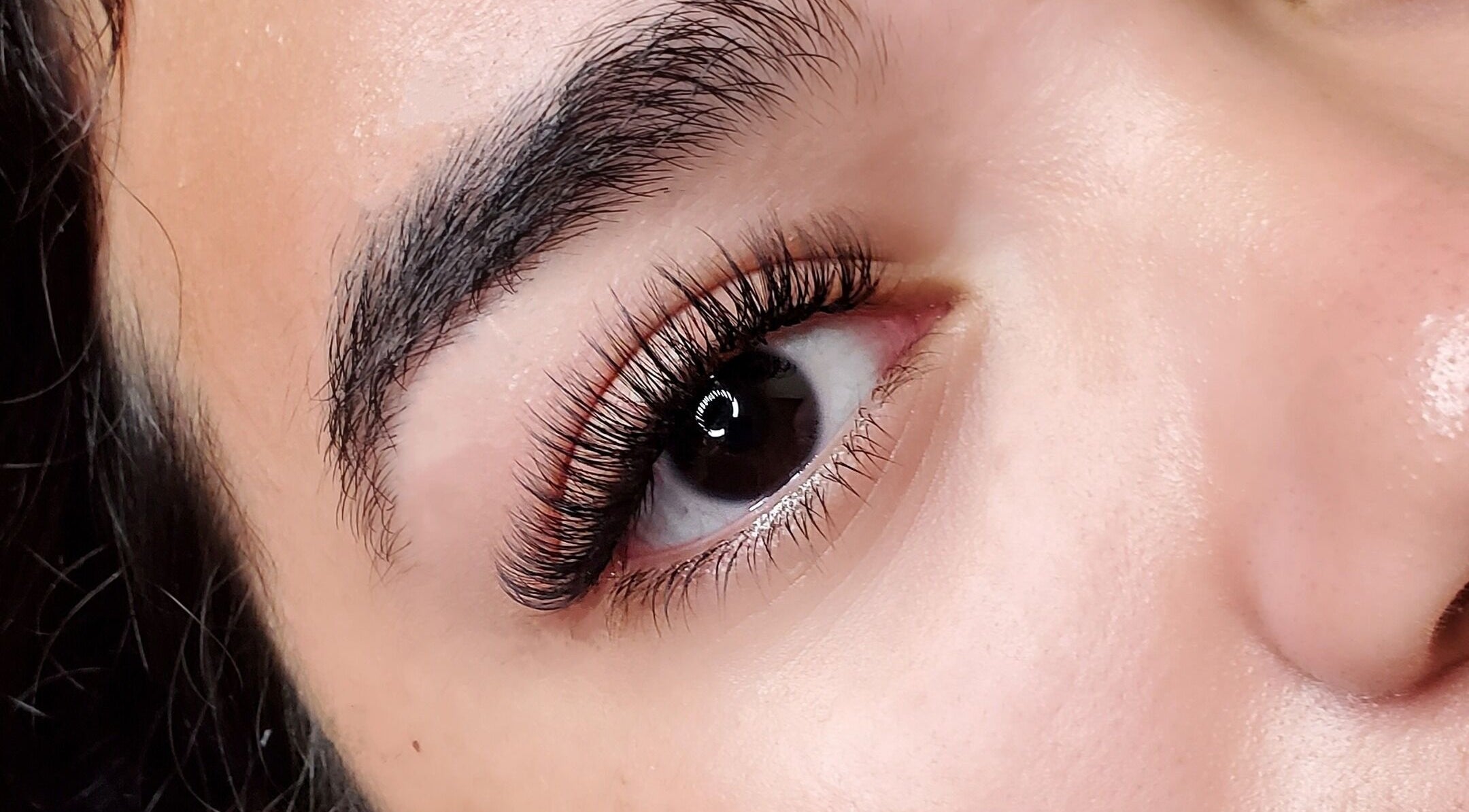 Close-up of lush eyelashes at London Aesthetics, London, Ontario, CA for beauty enhancement.