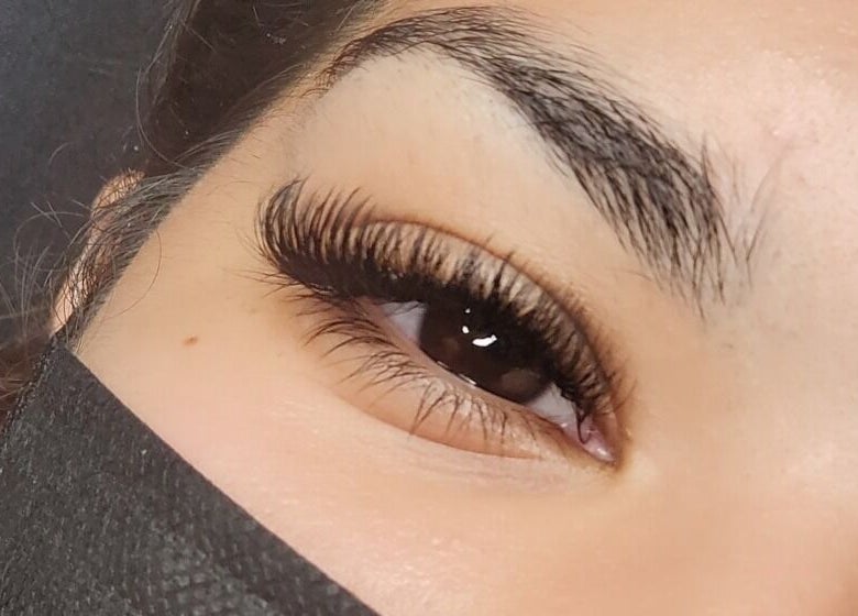 Close-up of expertly applied eyelash extensions at London Aesthetics, London, Ontario, CA.