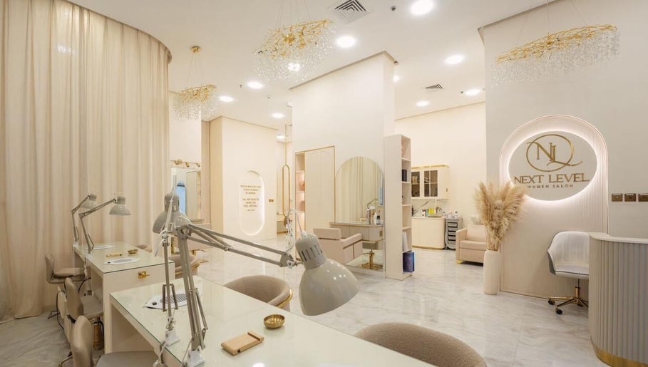 Interior of Next Level Women Salon in Dubai, AE with modern decor and beauty stations.