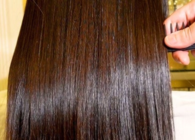 Smooth, shiny hair combed at Next Level Women Salon, Dubai, Dubai, AE.