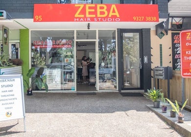 Front view of Zeba Hair Studio in Rose Bay, New South Wales, AU, showcasing the welcoming entrance and signage.