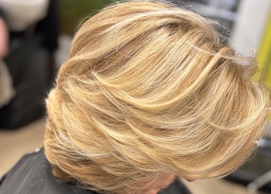Blonde hair styled in soft waves at Zeba Hair Studio, Rose Bay, New South Wales, AU.