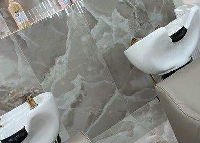 Elegant wash area at Nails by Emm Lou, Cheadle Hulme, England, GB, featuring modern design and luxurious fixtures.
