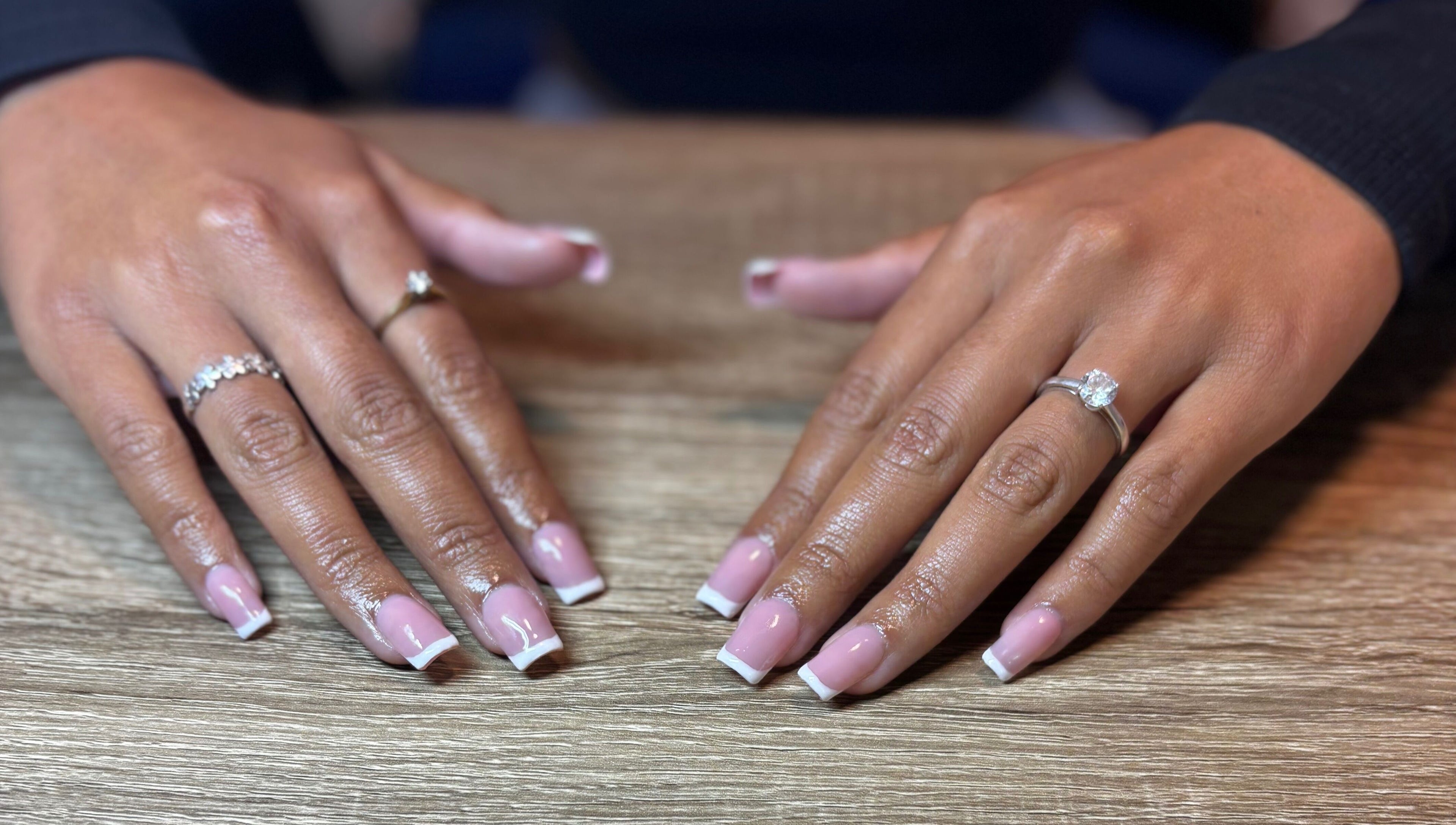Elegant manicure with pink French tips at Executive Elegance, Dunedin, Otago, NZ.