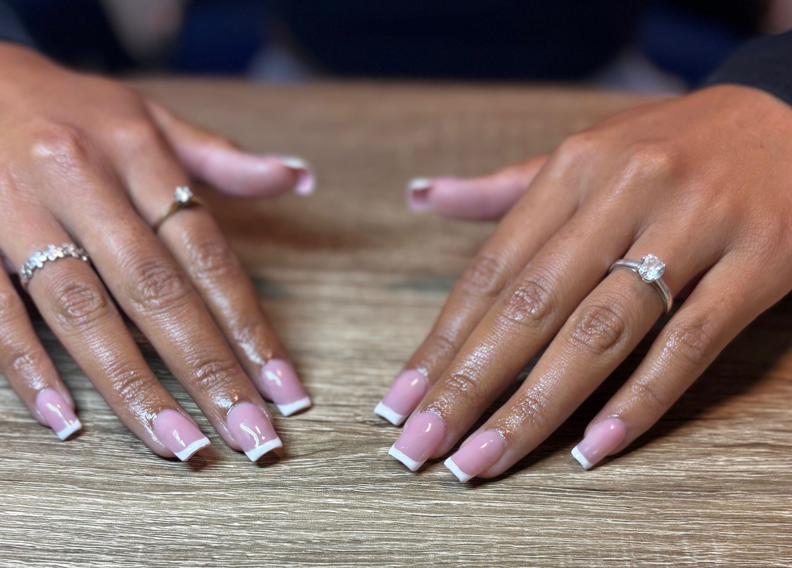 Elegant manicure with pink French tips at Executive Elegance, Dunedin, Otago, NZ.