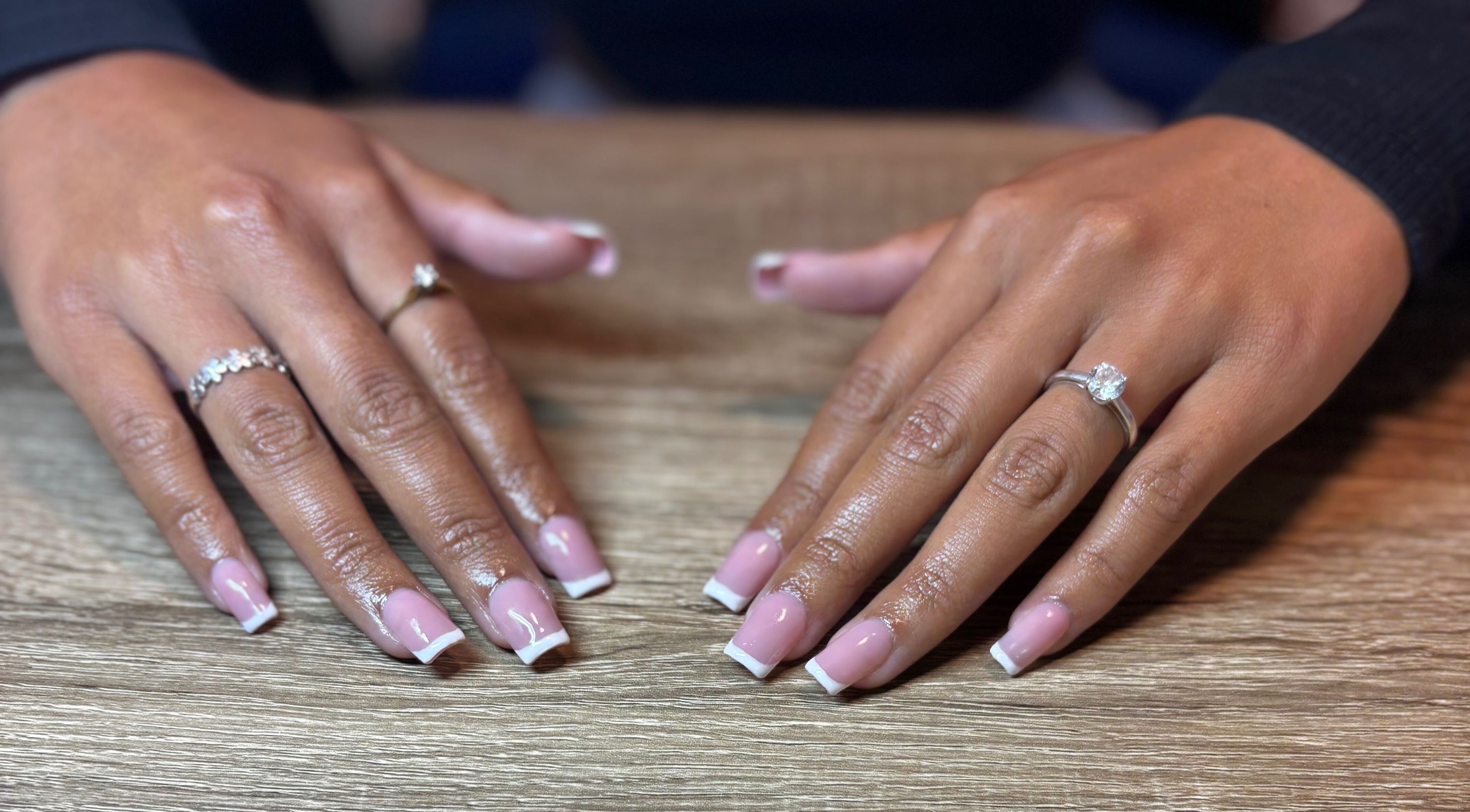 Elegant manicure with pink French tips at Executive Elegance, Dunedin, Otago, NZ.