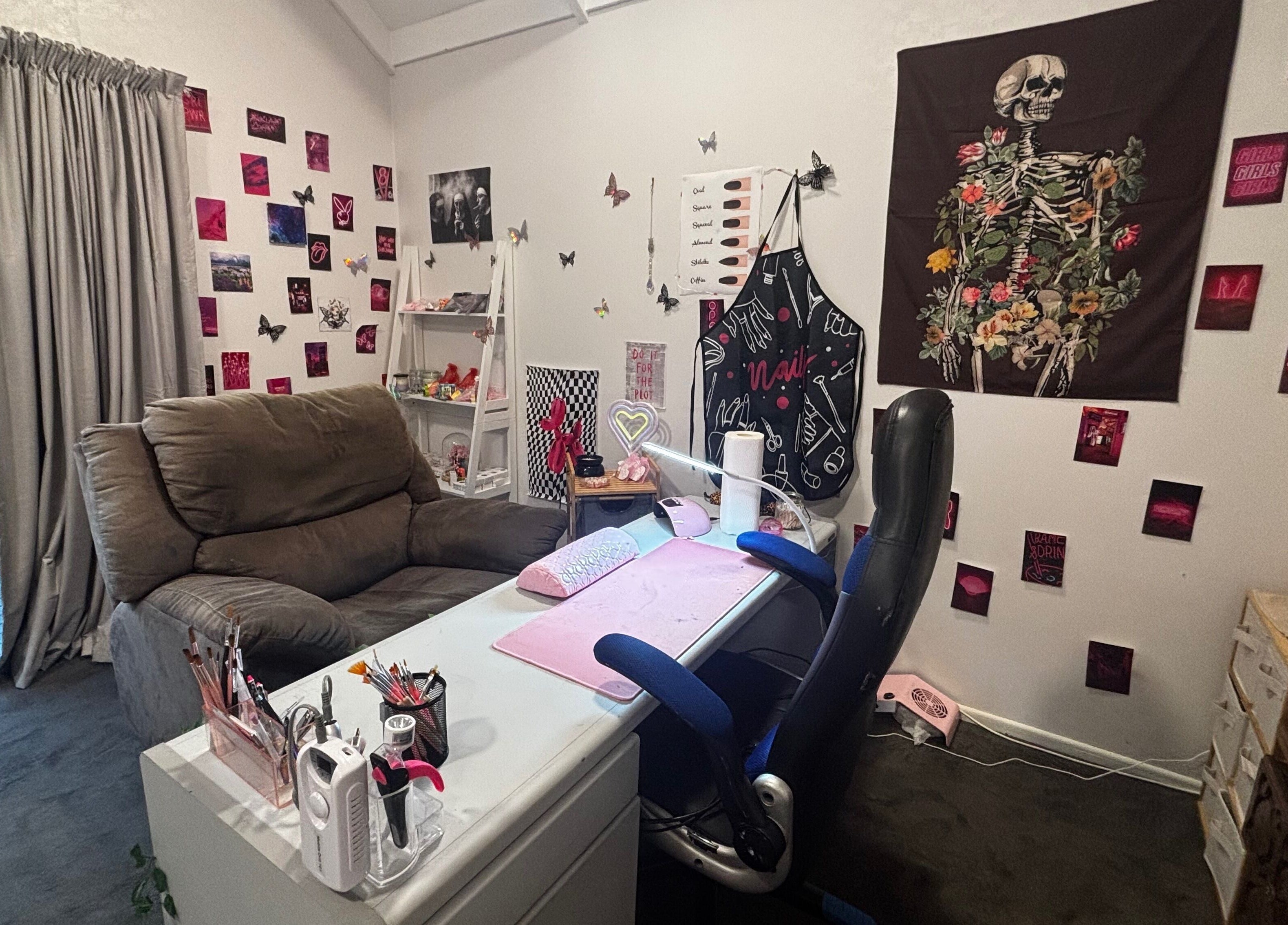 Chic nail studio at Executive Elegance, Dunedin, Otago, NZ with artistic decor and cozy seating.