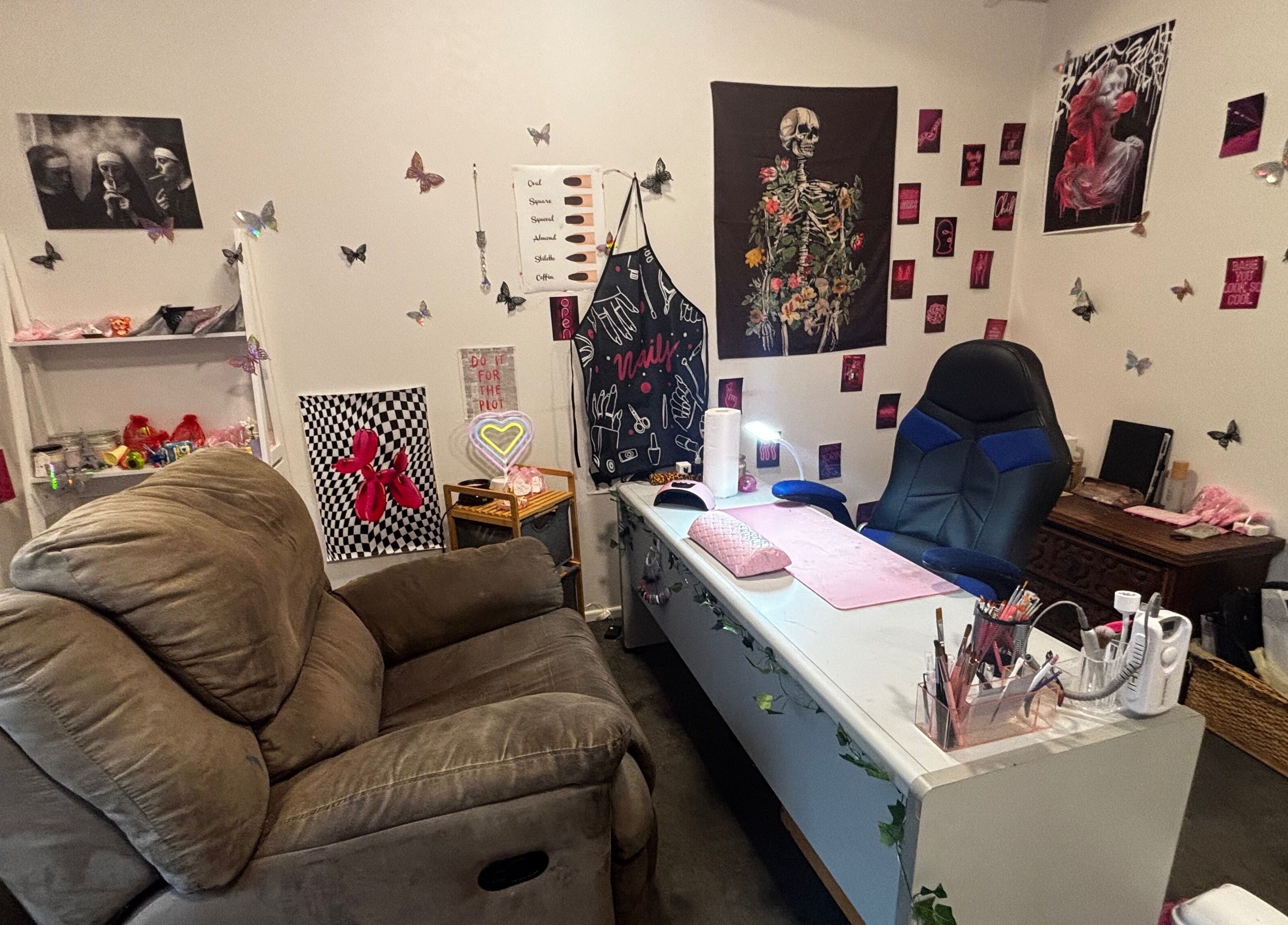 Chic beauty space at Executive Elegance, Dunedin, Otago, NZ with salon chair, decor, and nail art tools.