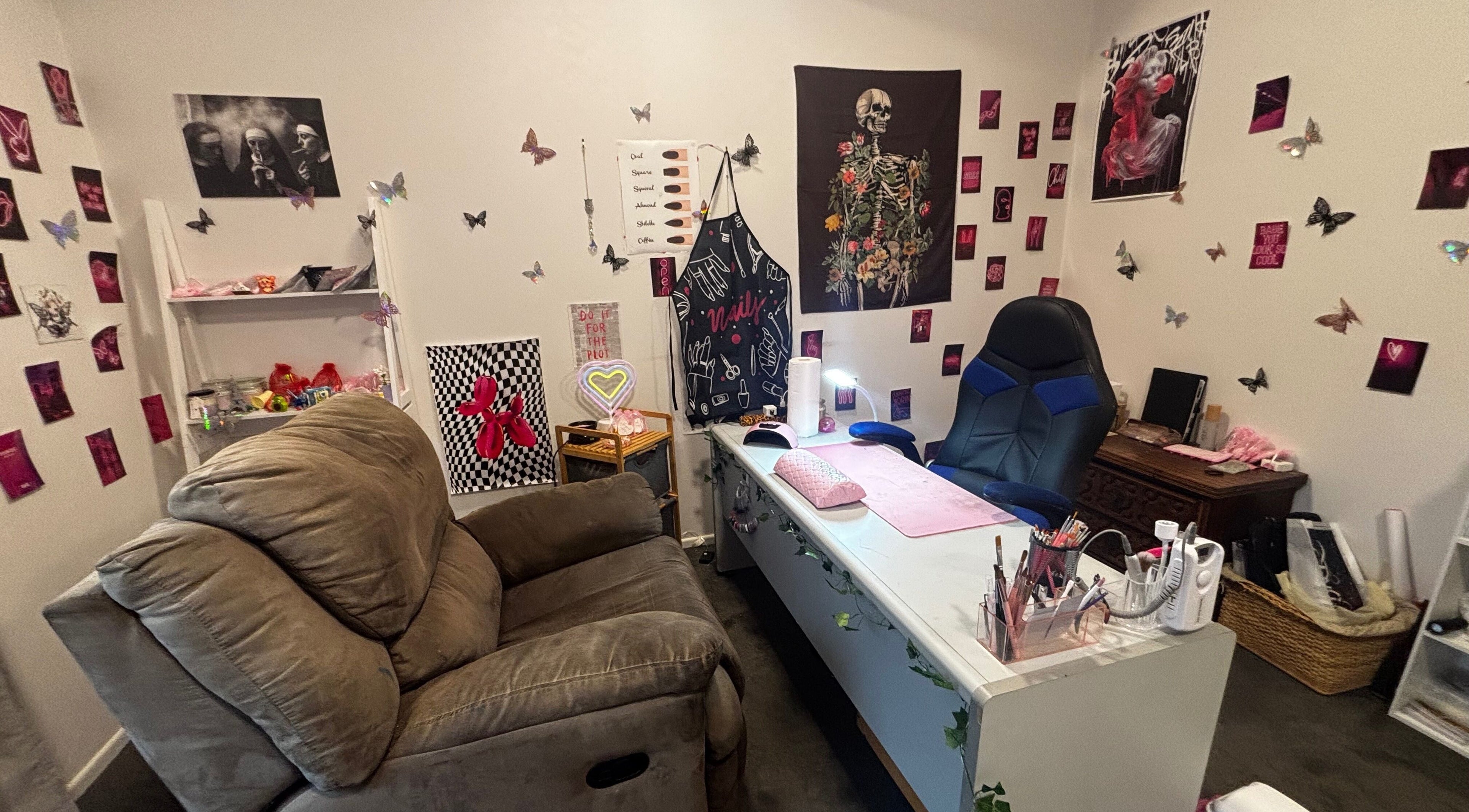 Chic beauty space at Executive Elegance, Dunedin, Otago, NZ with salon chair, decor, and nail art tools.